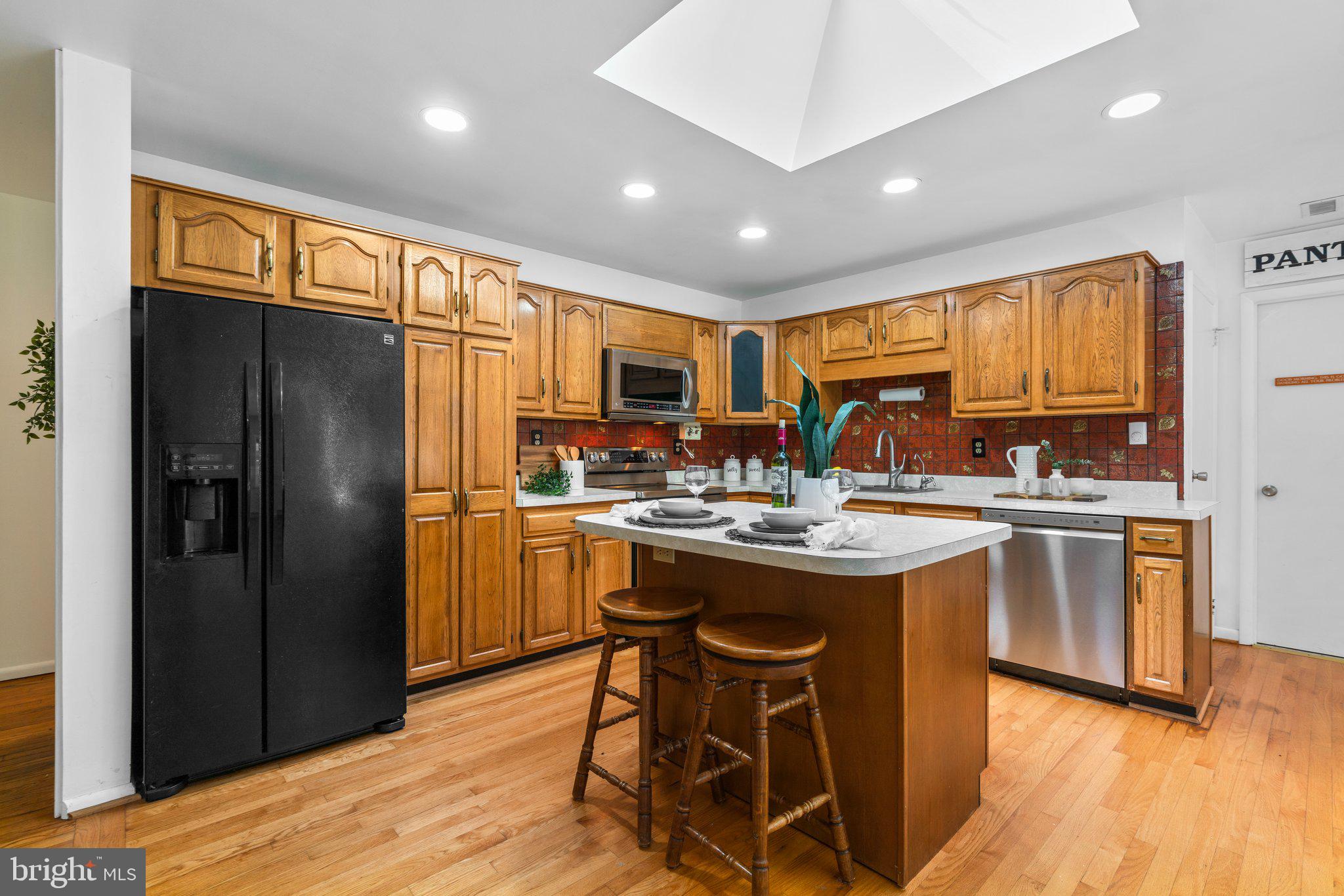 12412 Hall Shop Road Fulton, MD 20759 - Photo 22 of 97 Main level; kitchen w/ skylight/natural light.