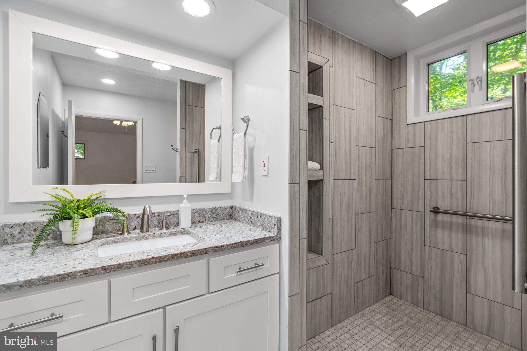 12412 Hall Shop Road Fulton, MD 20759 - Photo 33 of 97 Main level; primary bath, renovated/modern.