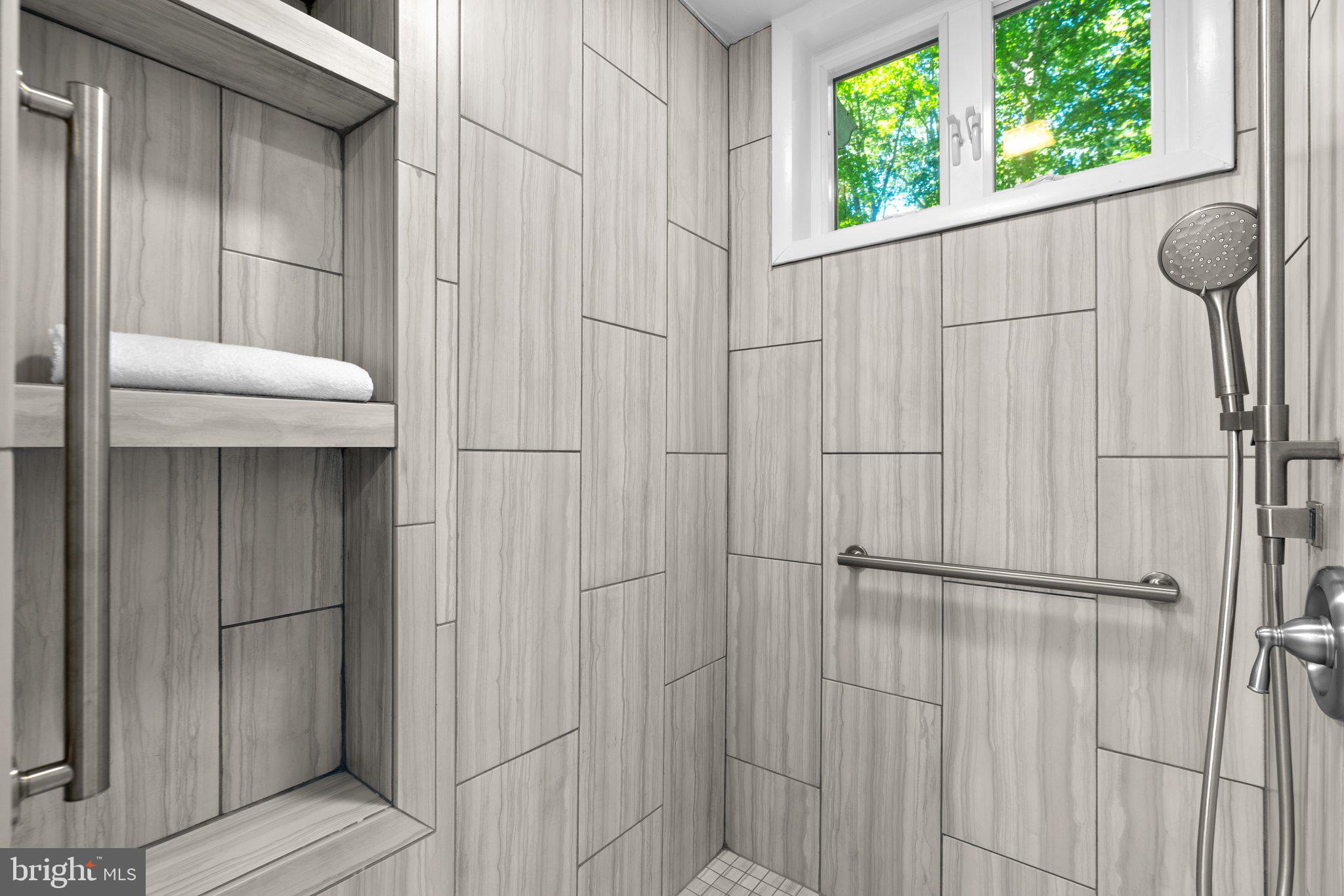 12412 Hall Shop Road Fulton, MD 20759 - Photo 34 of 97 Main level; primary bath w/ roll in shower.