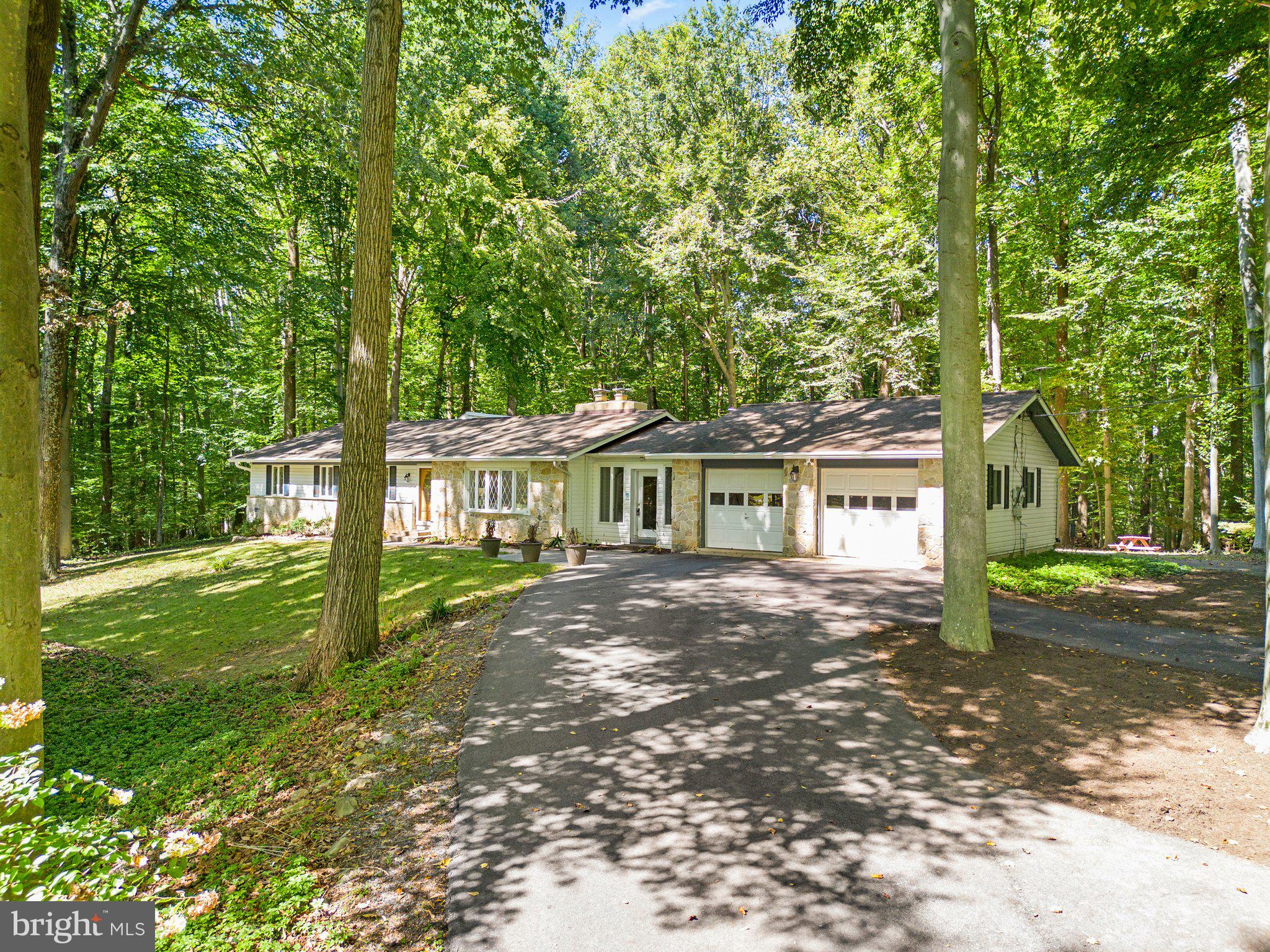 12412 Hall Shop Road Fulton, MD 20759 - Photo 5 of 97 Recently paved, circular asphalt driveway.