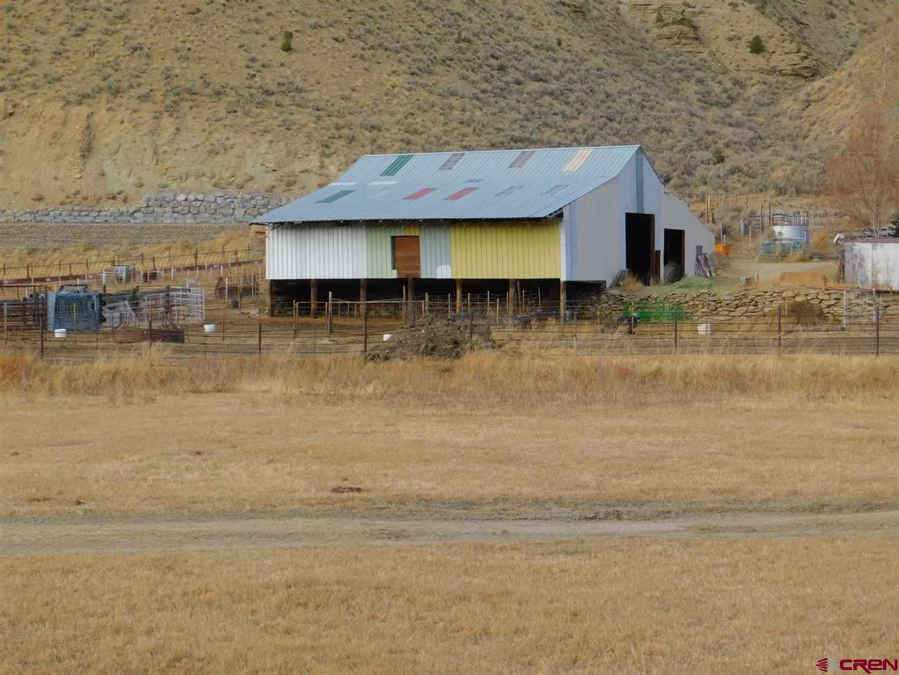 11539 Rbc 5 Road Rifle, CO 81650 - Photo 14 of 34 a view of a house with a yard
