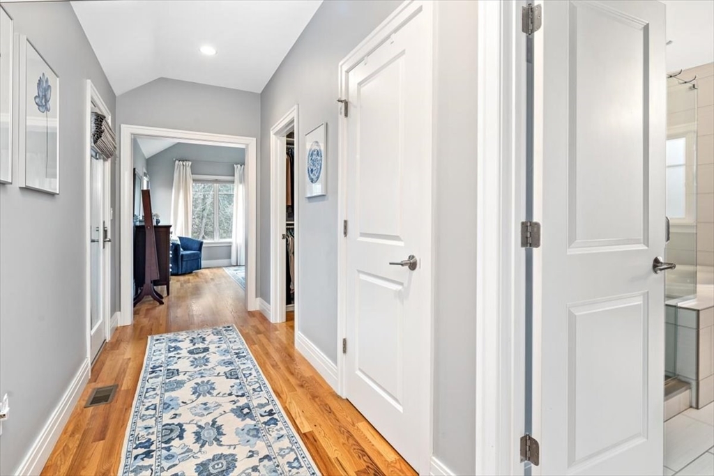 22 Raynor Drive, Unit 22 Hingham, MA 02043 - Photo 15 of 41 a view of a hallway with wooden floor and windows