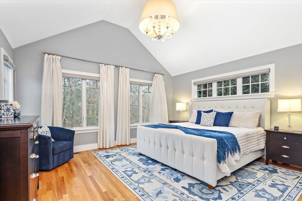 22 Raynor Drive, Unit 22 Hingham, MA 02043 - Photo 16 of 41 a bedroom with a large bed and a window