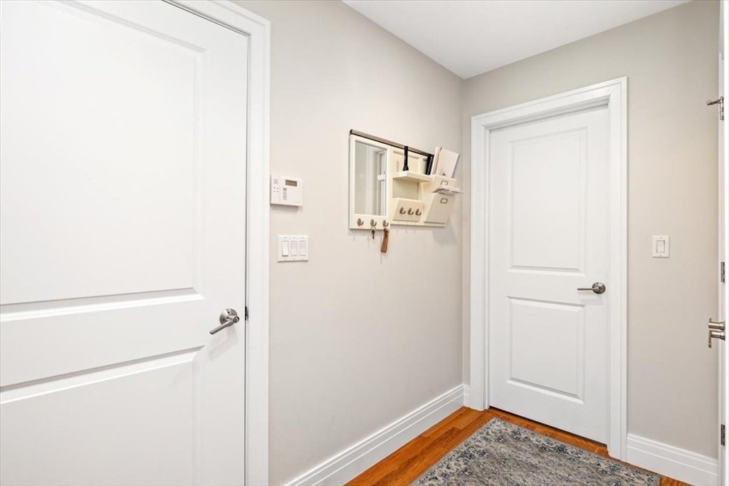 22 Raynor Drive, Unit 22 Hingham, MA 02043 - Photo 19 of 41 a view of a room with wooden floor