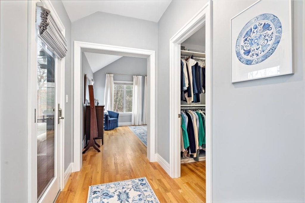 22 Raynor Drive, Unit 22 Hingham, MA 02043 - Photo 21 of 41 a walk in closet with wooden floor