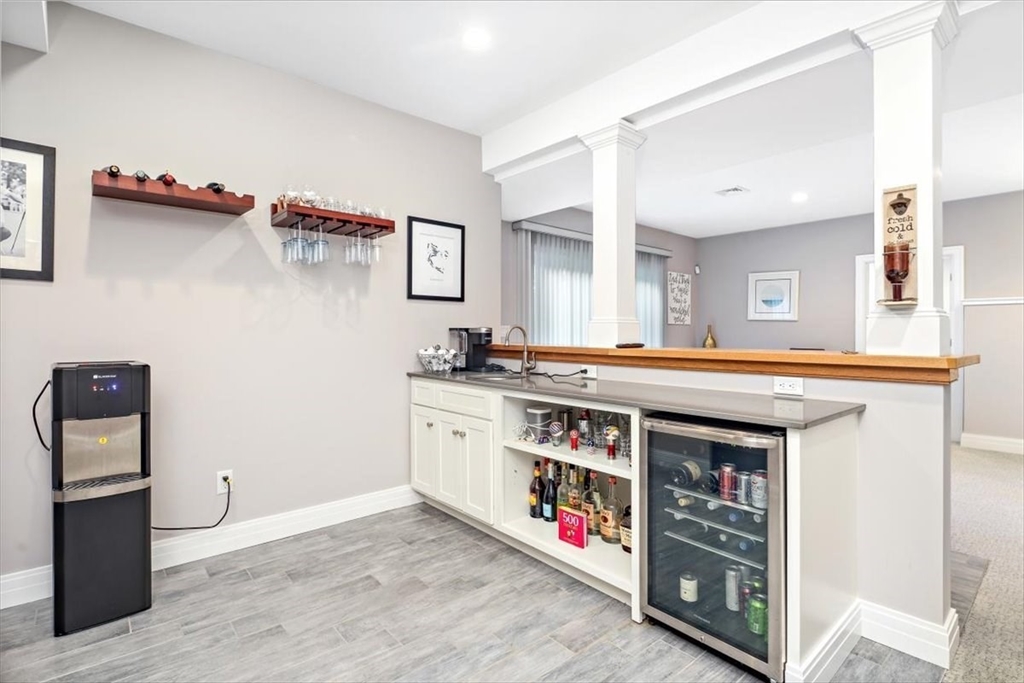 22 Raynor Drive, Unit 22 Hingham, MA 02043 - Photo 30 of 41 a kitchen with stainless steel appliances granite countertop a stove and cabinets