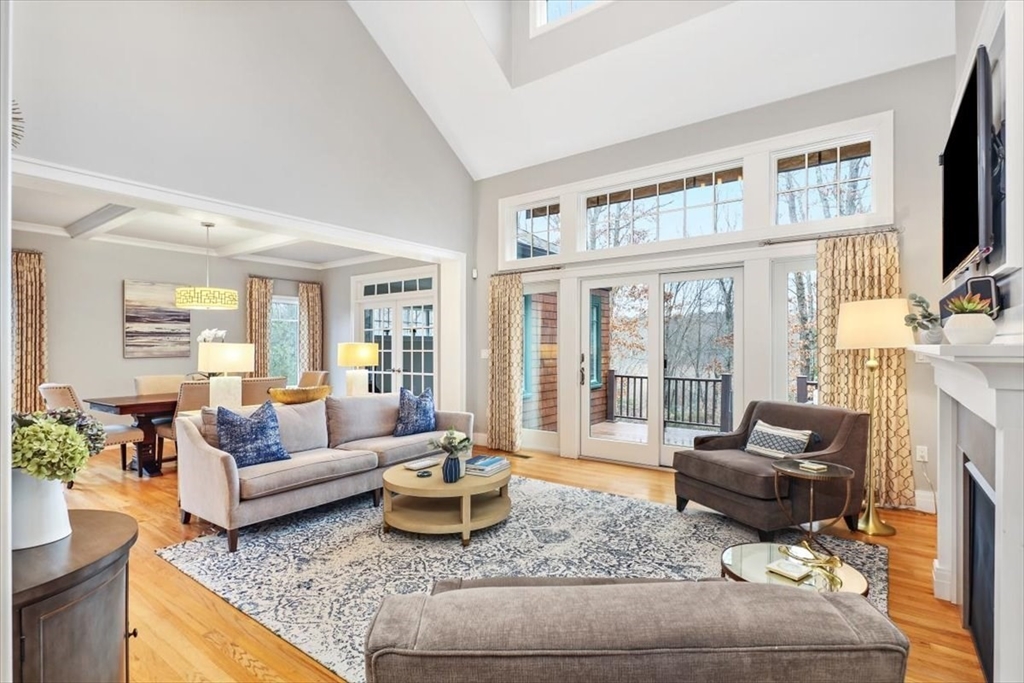 22 Raynor Drive, Unit 22 Hingham, MA 02043 - Photo 7 of 41 a living room with furniture and a flat screen tv
