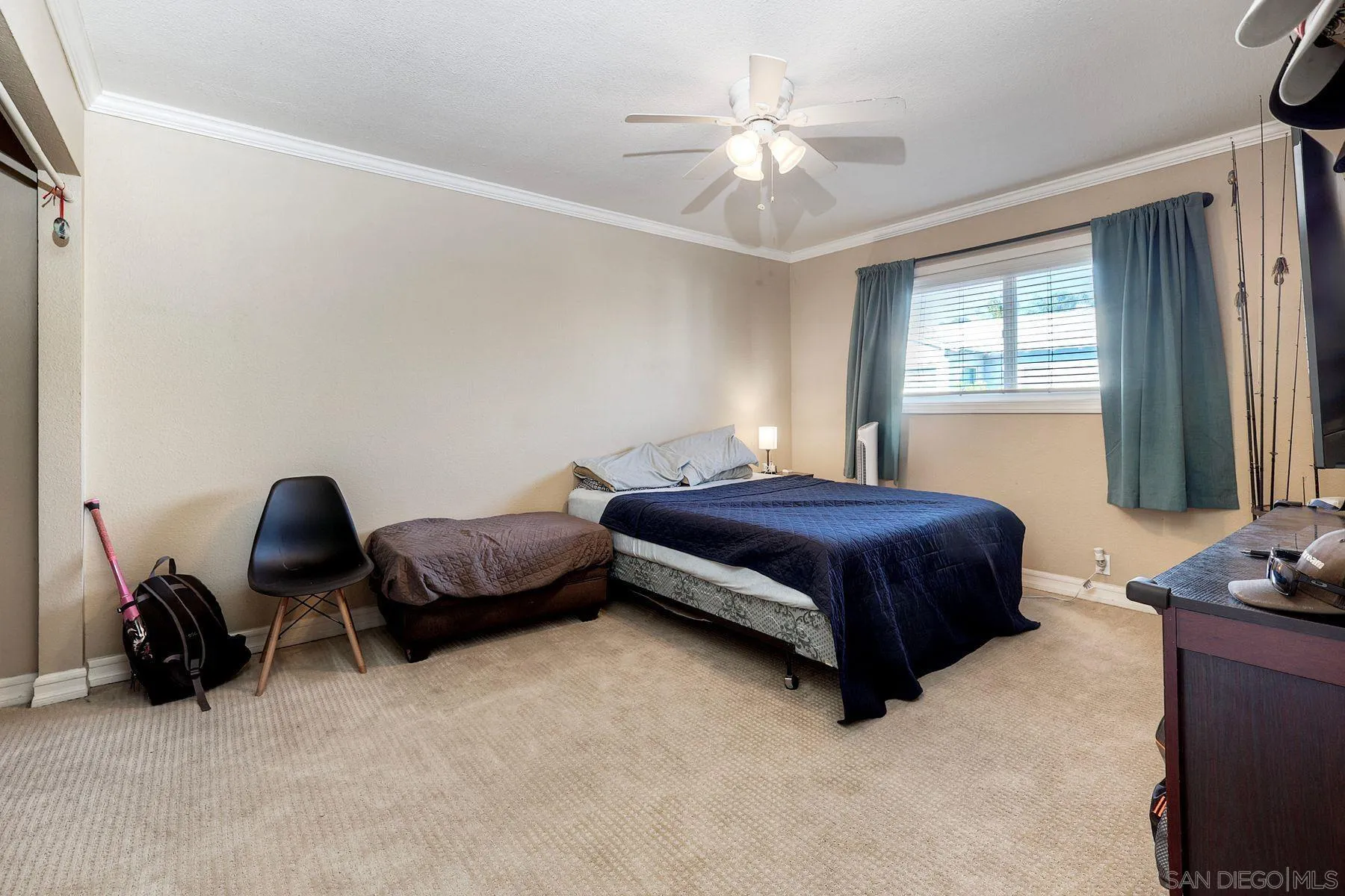 12923 Mapleview Street, Unit 6 Lakeside, CA 92040 - Photo 19 of 25 a spacious bedroom with a bed and window