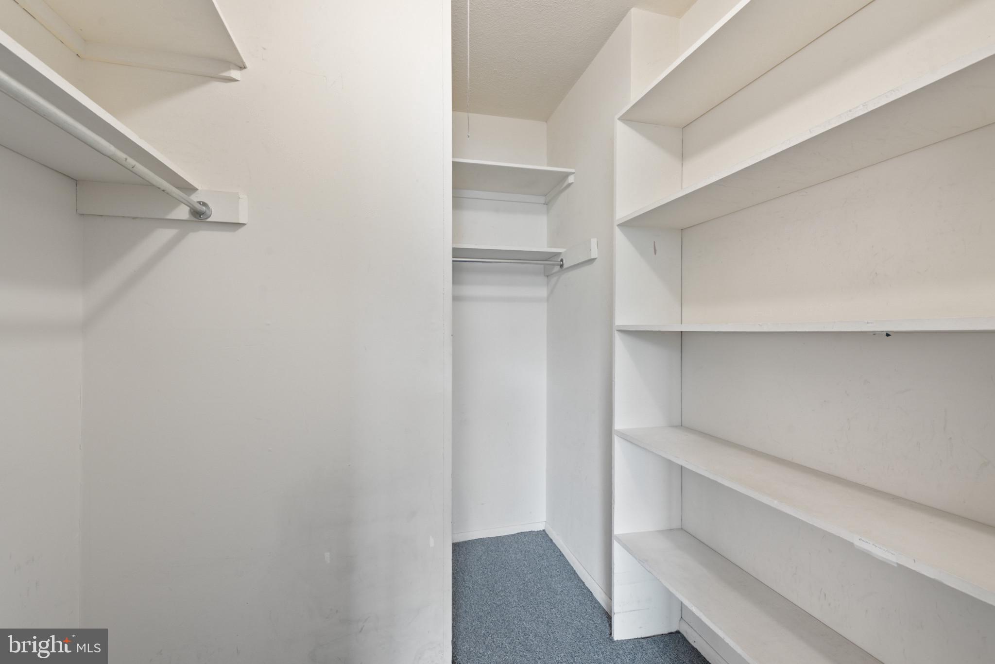 1 East University Parkway, Unit 304 Baltimore, MD 21218 - Photo 15 of 18 a view of an empty walk in closet