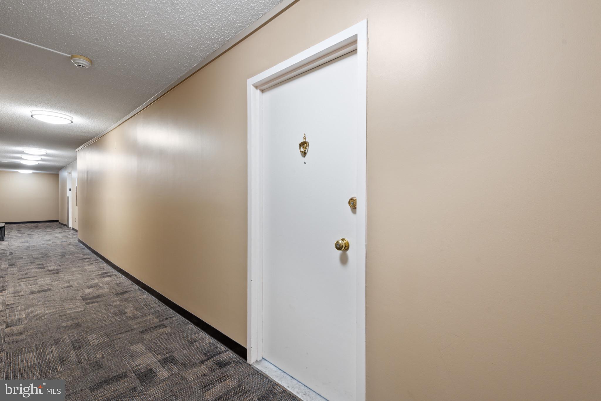 1 East University Parkway, Unit 304 Baltimore, MD 21218 - Photo 18 of 18 a view of a hallway