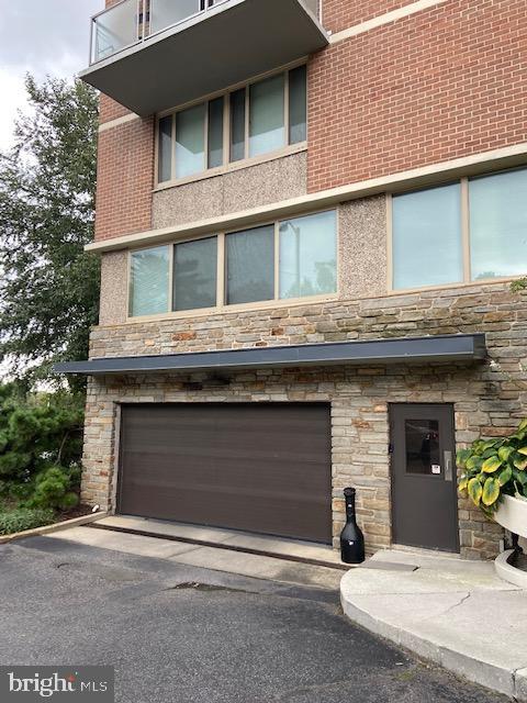 1 East University Parkway, Unit 304 Baltimore, MD 21218 - Photo 2 of 18 a front view of a house