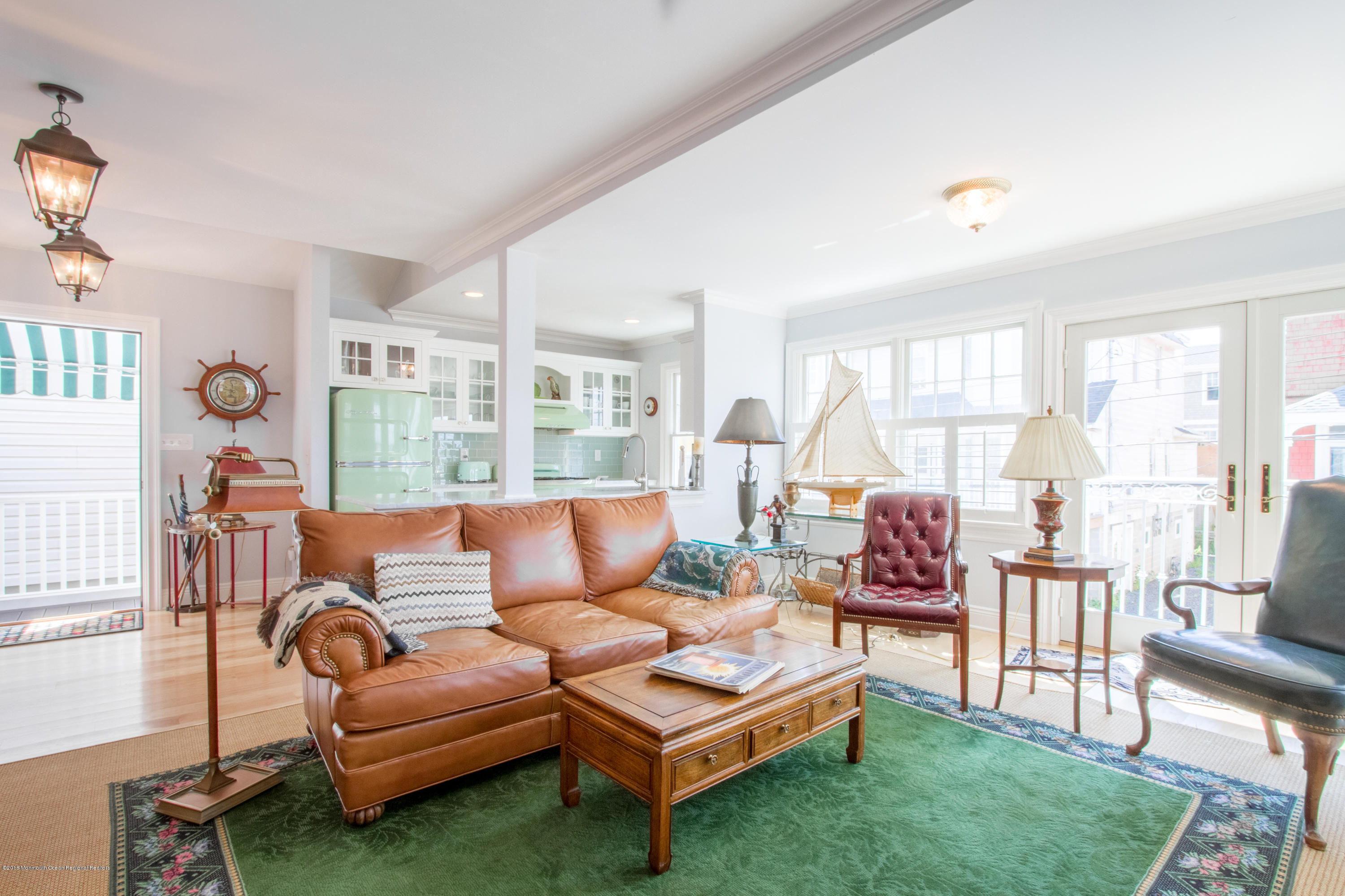 27 Center Street Sea Bright, NJ 07760 - Photo 14 of 51 a living room with furniture and a large window