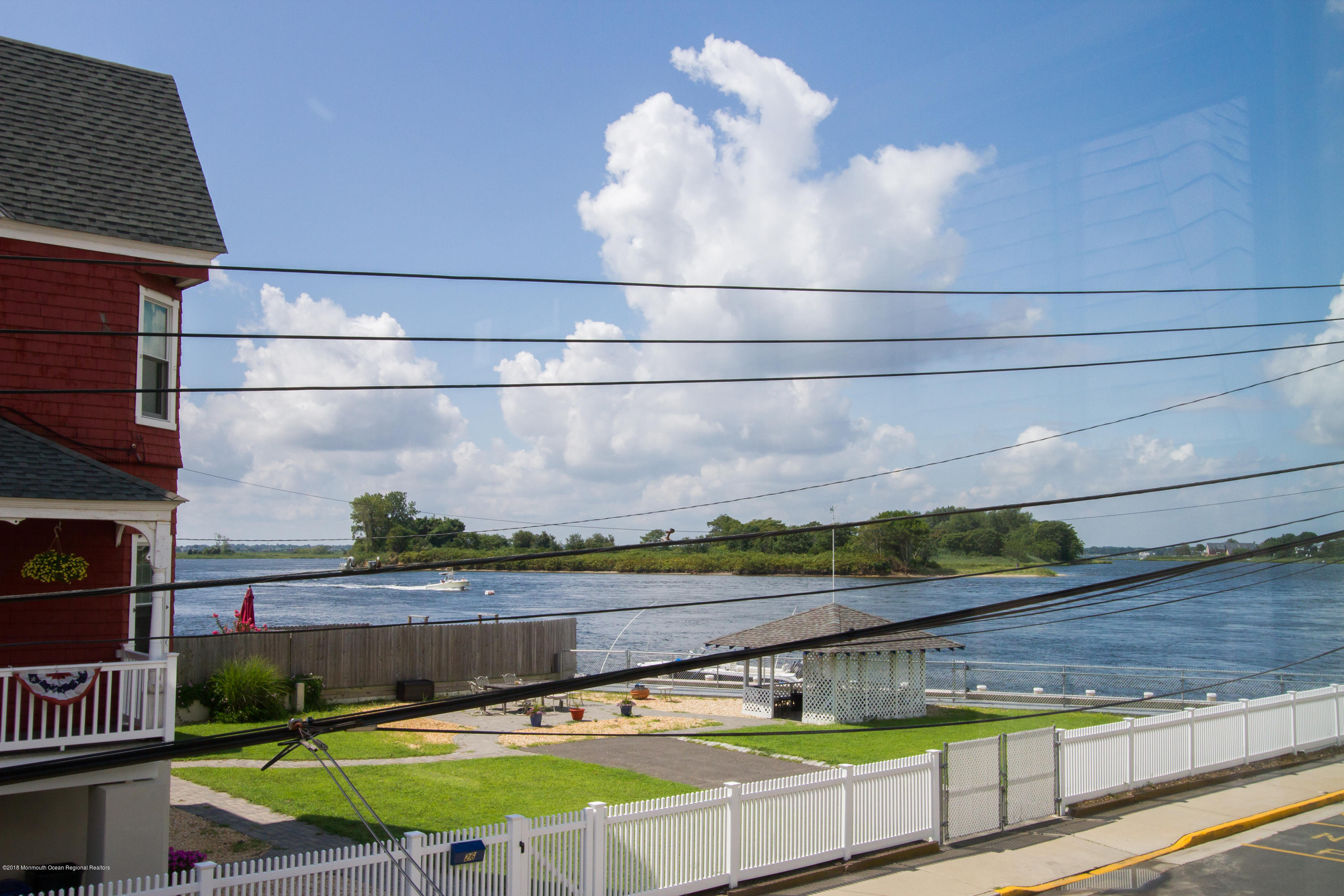 27 Center Street Sea Bright, NJ 07760 - Photo 16 of 51 a view of a swimming pool with a patio