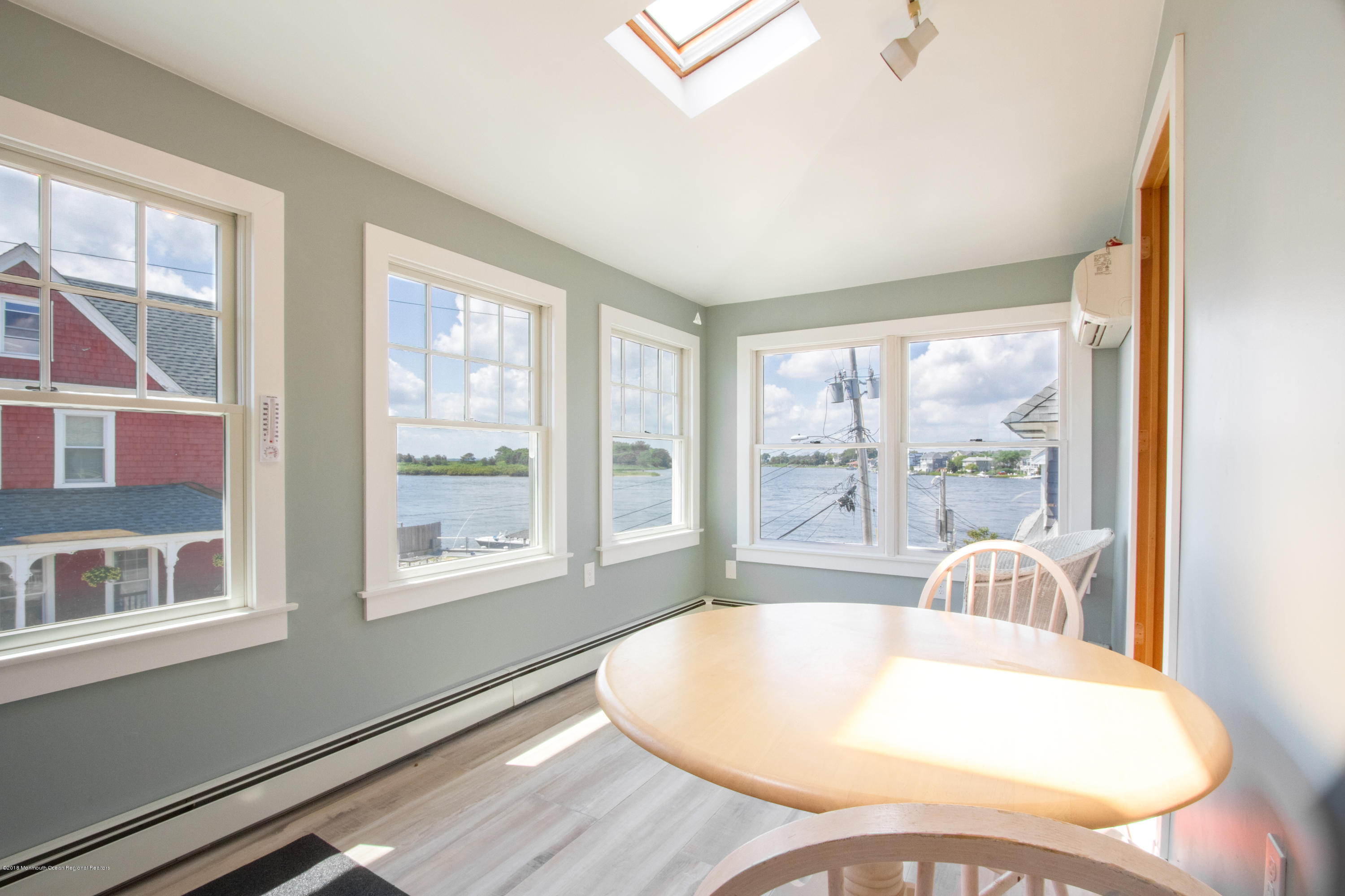 27 Center Street Sea Bright, NJ 07760 - Photo 33 of 51 a living room with large window
