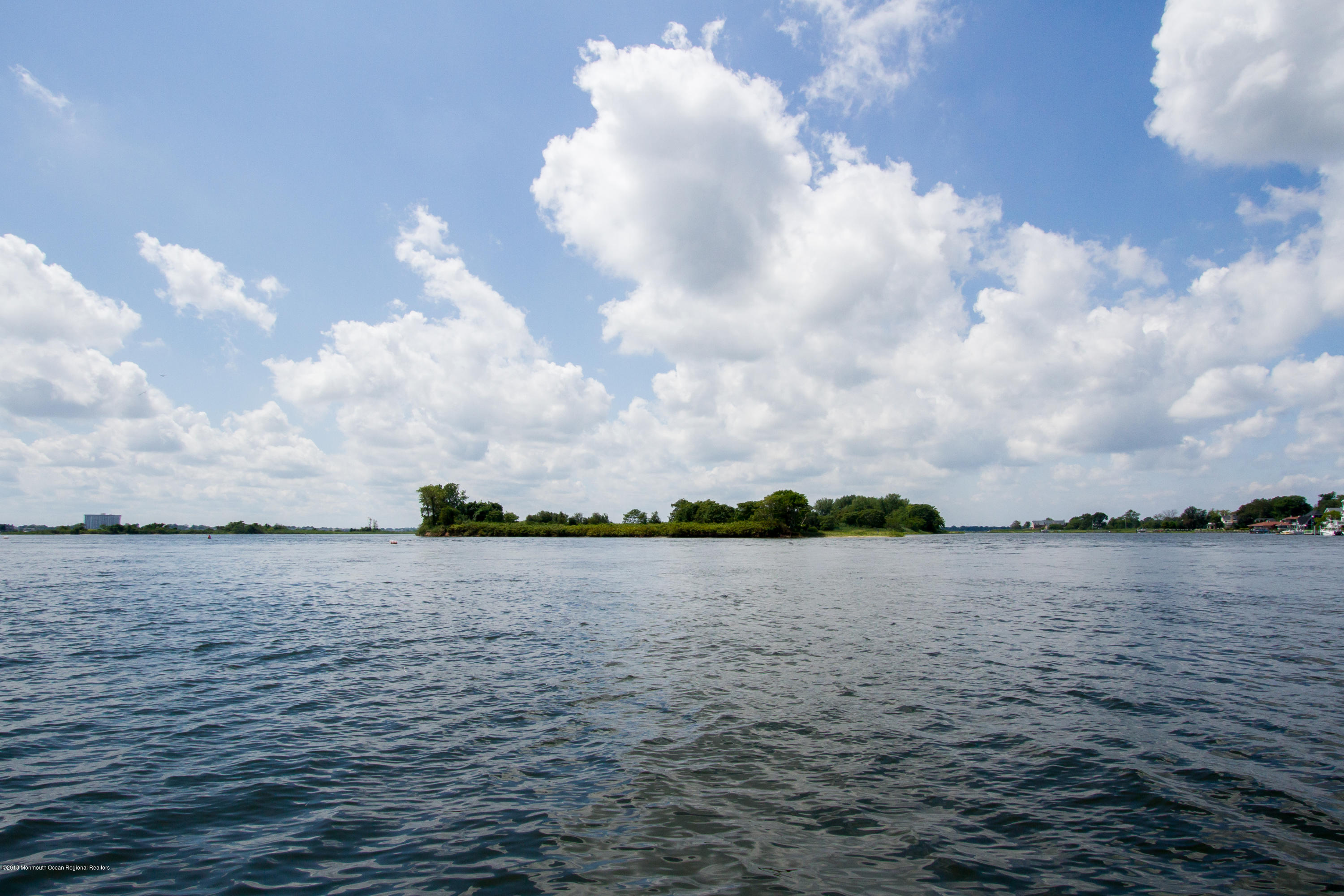 27 Center Street Sea Bright, NJ 07760 - Photo 40 of 51 a view of outside space and lake