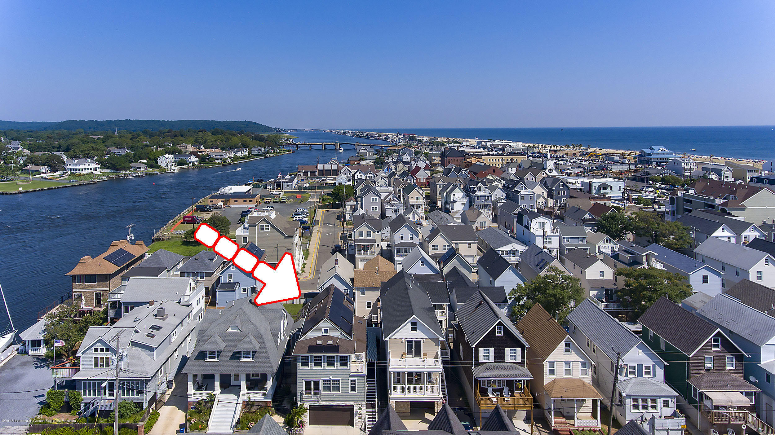 27 Center Street Sea Bright, NJ 07760 - Photo 45 of 51 an aerial view of a city with lots of residential buildings