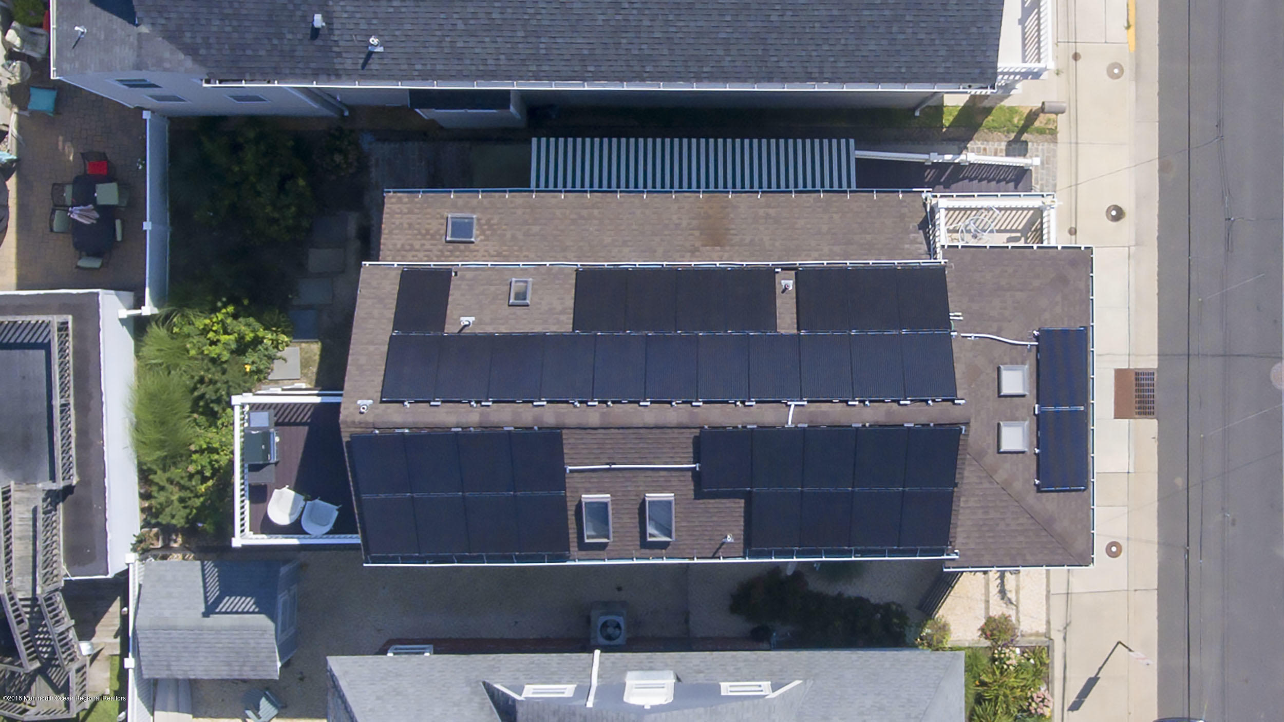 27 Center Street Sea Bright, NJ 07760 - Photo 48 of 51 an aerial view of a house with a yard