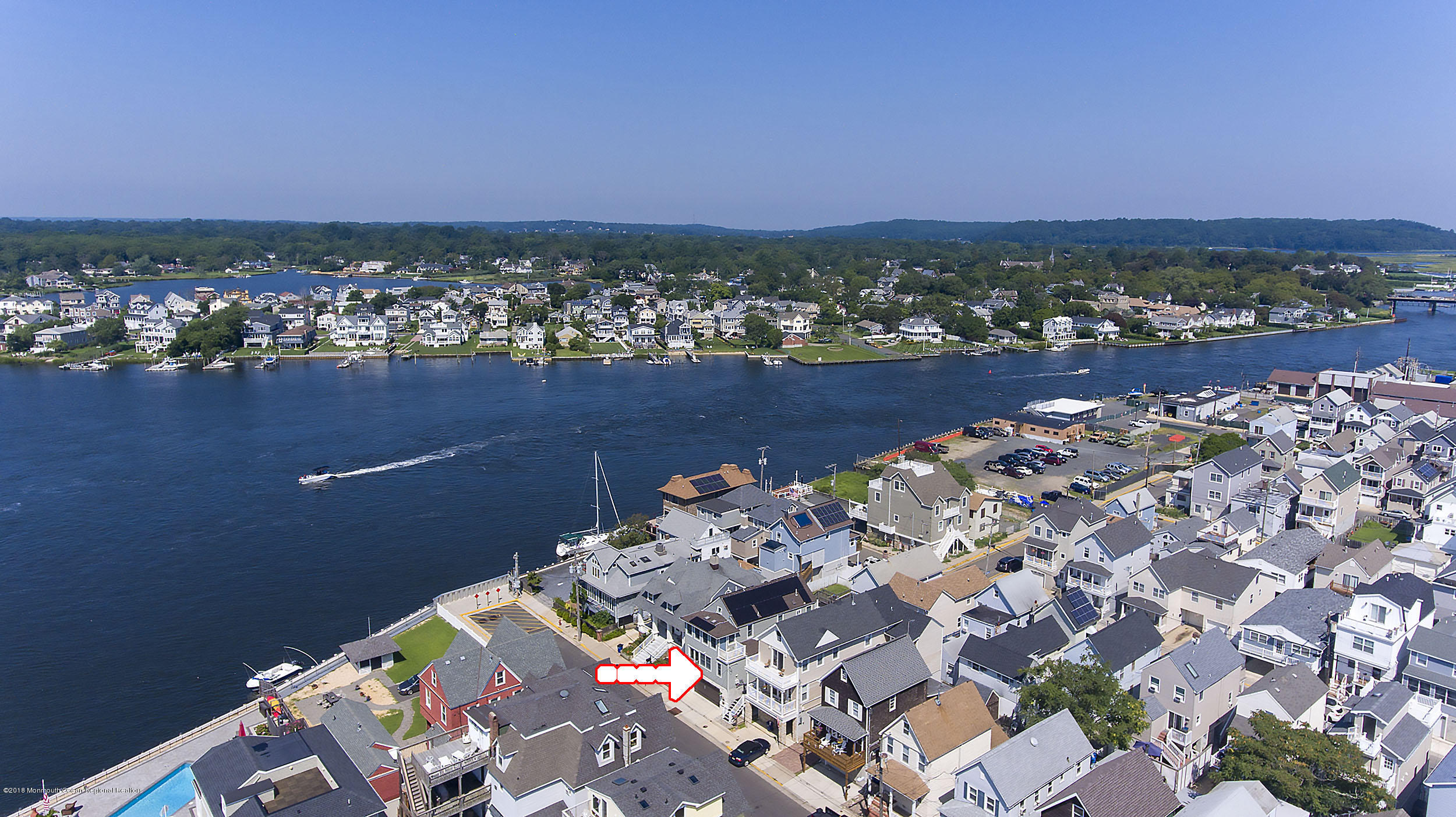 27 Center Street Sea Bright, NJ 07760 - Photo 49 of 51 an aerial view of a house with a lake view