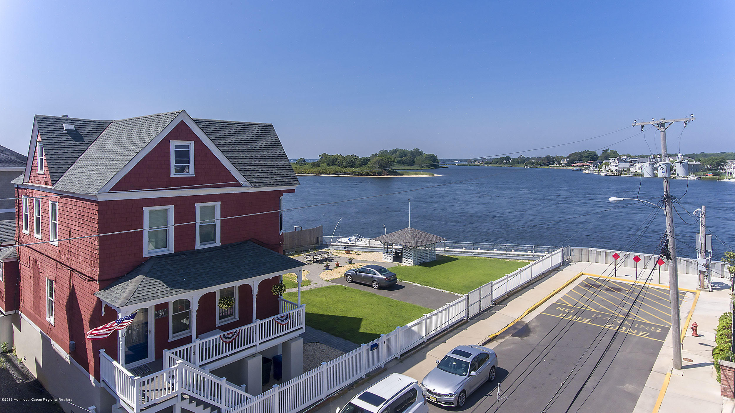 27 Center Street Sea Bright, NJ 07760 - Photo 50 of 51 a aerial view of a house with pool and lake view