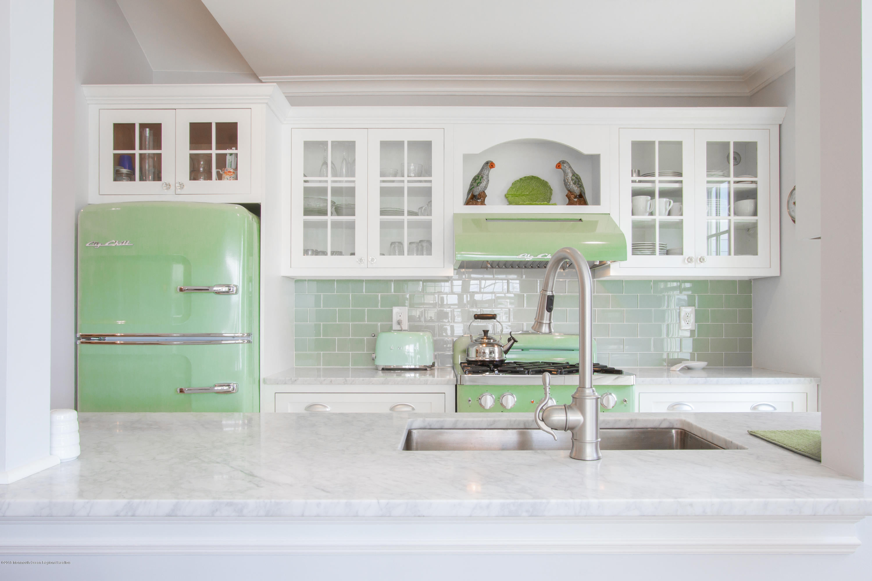 27 Center Street Sea Bright, NJ 07760 - Photo 10 of 51 a front view of a house with a garden