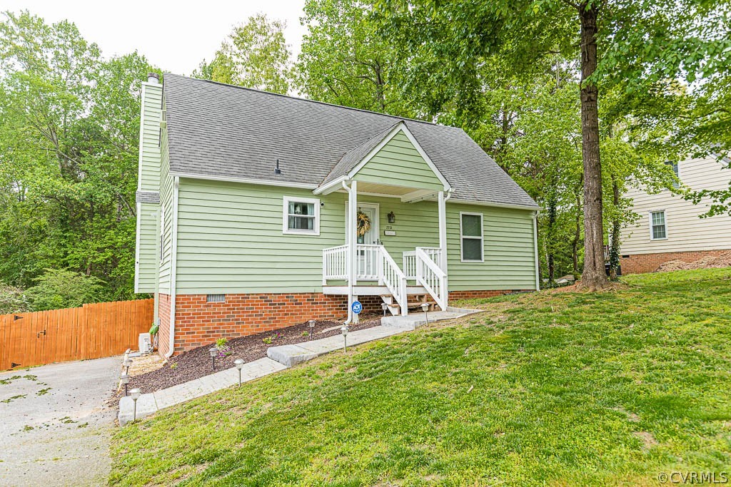 2713 South Ridge Drive Midlothian, VA 23112 - Photo 1 of 49 a backyard of a house with table and chairs
