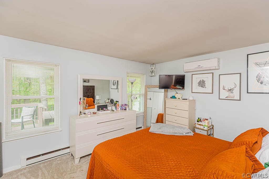 2713 South Ridge Drive Midlothian, VA 23112 - Photo 20 of 49 a bedroom with a bed window and flat screen tv