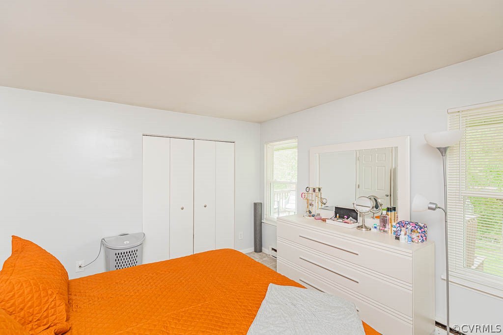 2713 South Ridge Drive Midlothian, VA 23112 - Photo 22 of 49 a bedroom with a bed and a closet