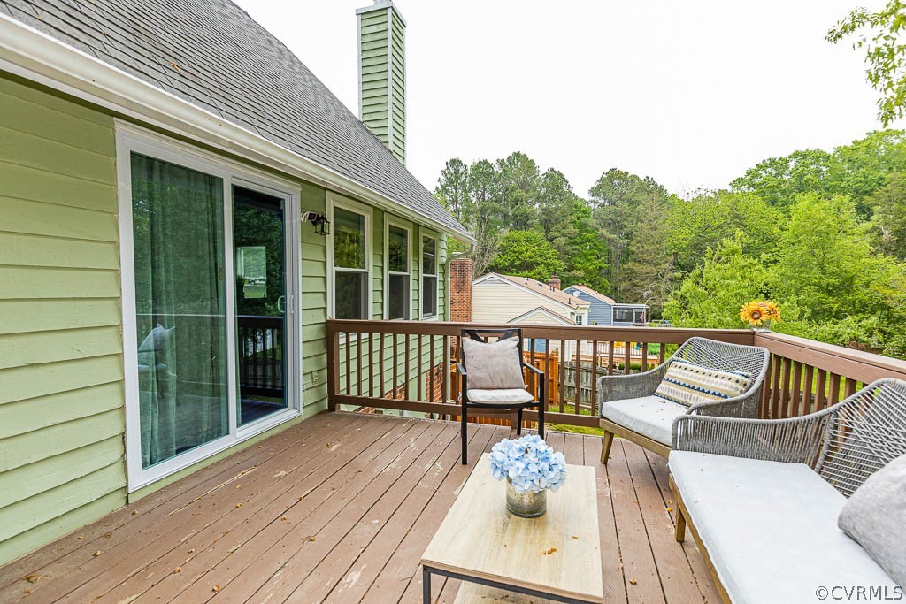 2713 South Ridge Drive Midlothian, VA 23112 - Photo 35 of 49 a view of a balcony with wooden floor and outdoor seating