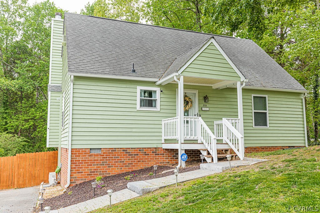 2713 South Ridge Drive Midlothian, VA 23112 - Photo 44 of 49 a view of backyard with a chair and table