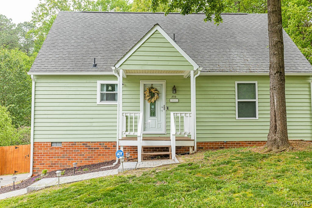 2713 South Ridge Drive Midlothian, VA 23112 - Photo 45 of 49 a front view of a house with a yard