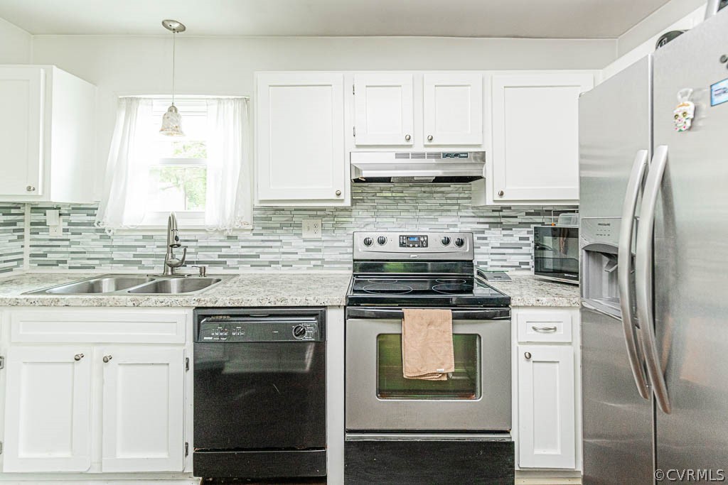 2713 South Ridge Drive Midlothian, VA 23112 - Photo 5 of 49 a kitchen with stainless steel appliances granite countertop a stove a refrigerator and a sink