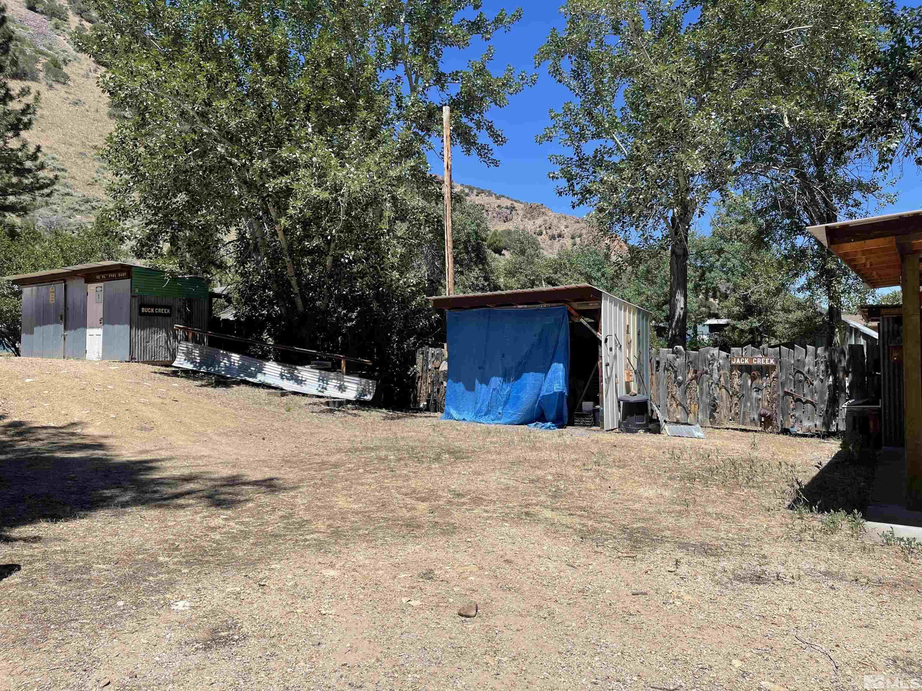 202 Main Street Jarbidge, NV 89826 - Photo 17 of 20 a view of a yard with snow on the road