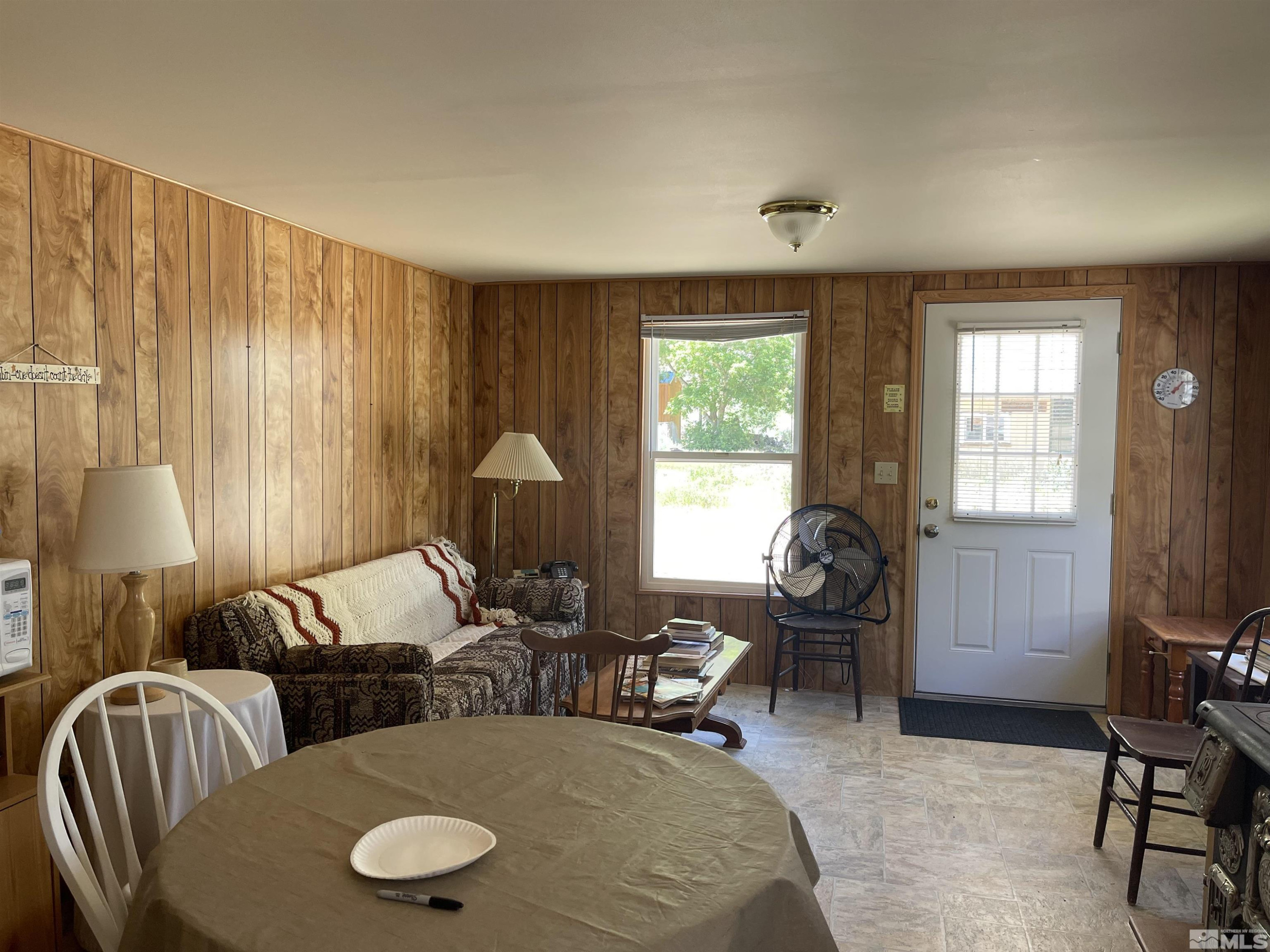 202 Main Street Jarbidge, NV 89826 - Photo 4 of 20 a living room with furniture and a large window