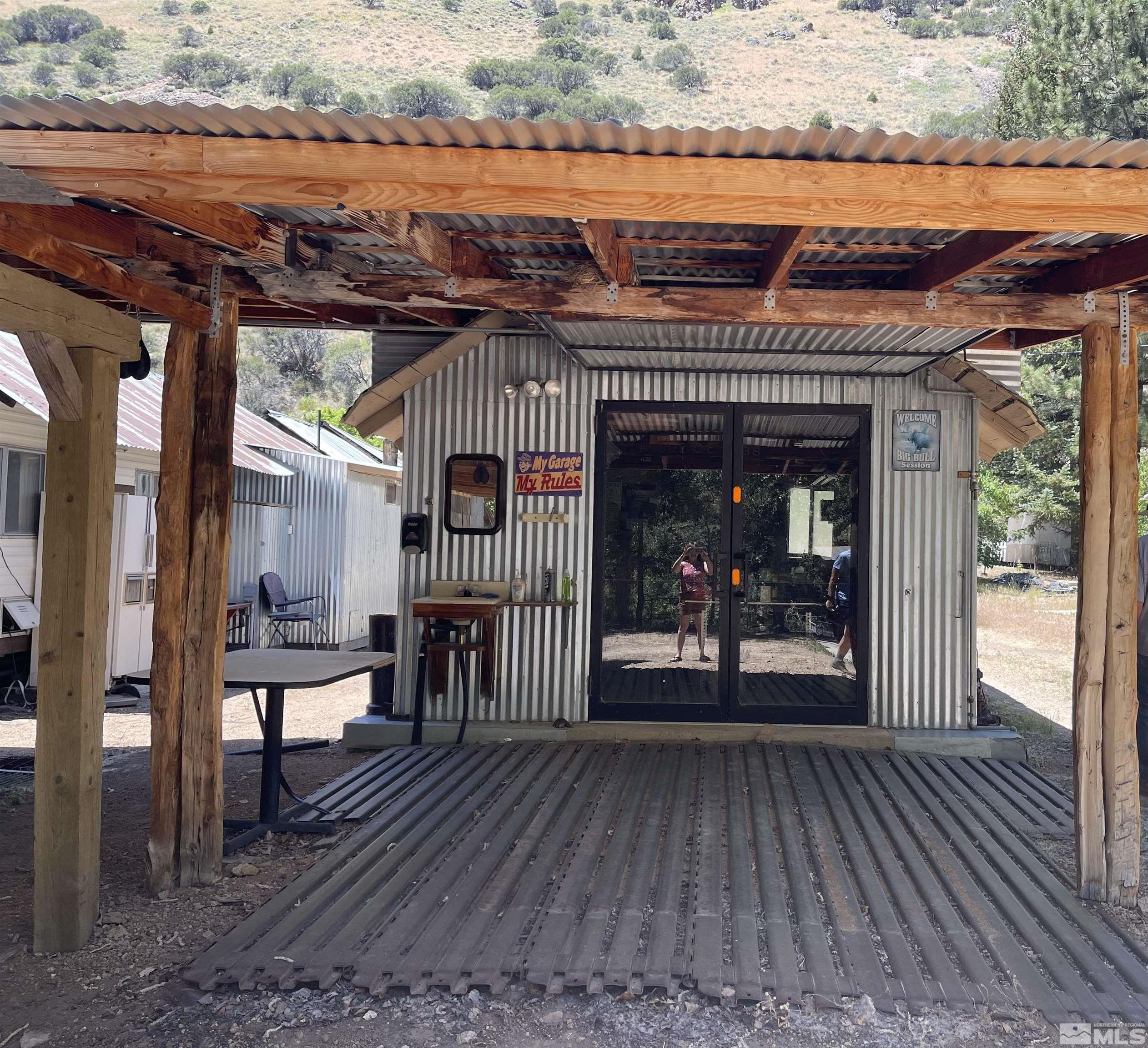 202 Main Street Jarbidge, NV 89826 - Photo 8 of 20 a view of a house with a porch