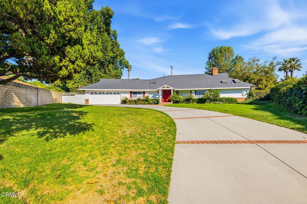 17933 Osborne Street Northridge, CA 91325 - Photo 2 of 33 a view of swimming pool with outdoor seating and green space