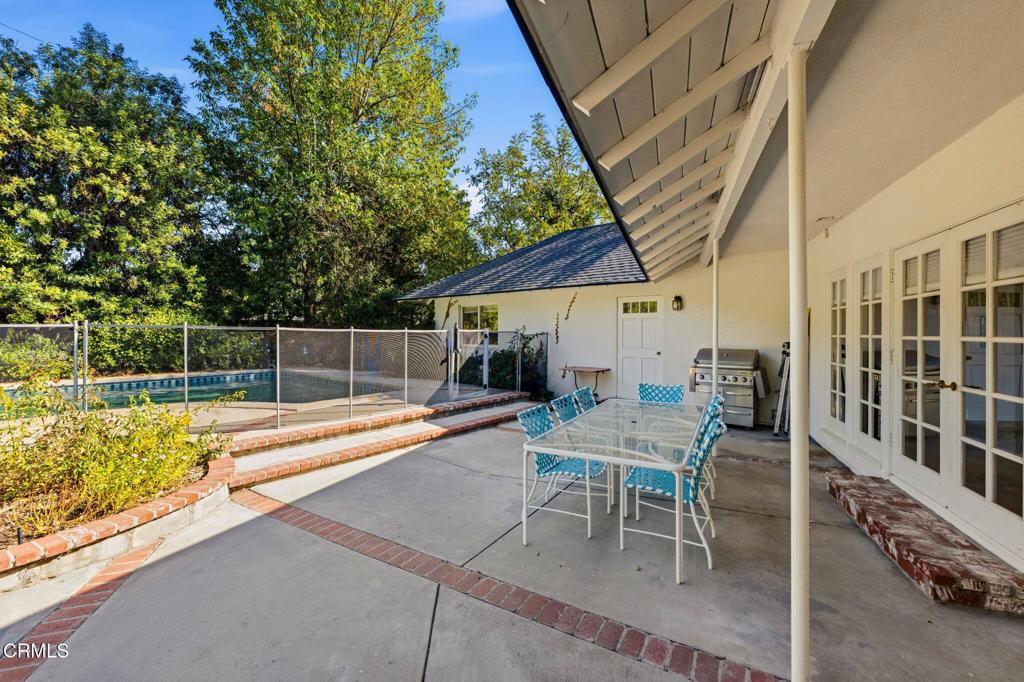 17933 Osborne Street Northridge, CA 91325 - Photo 27 of 33 a outdoor space with a large pool table and chairs