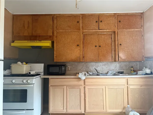 a workspace with furniture and a window