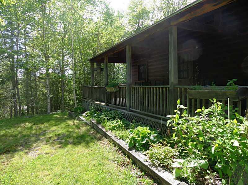 72 Corea Road Prospect Harbor, ME 04669 - Photo 18 of 32 Covered Porch. View along the front...
