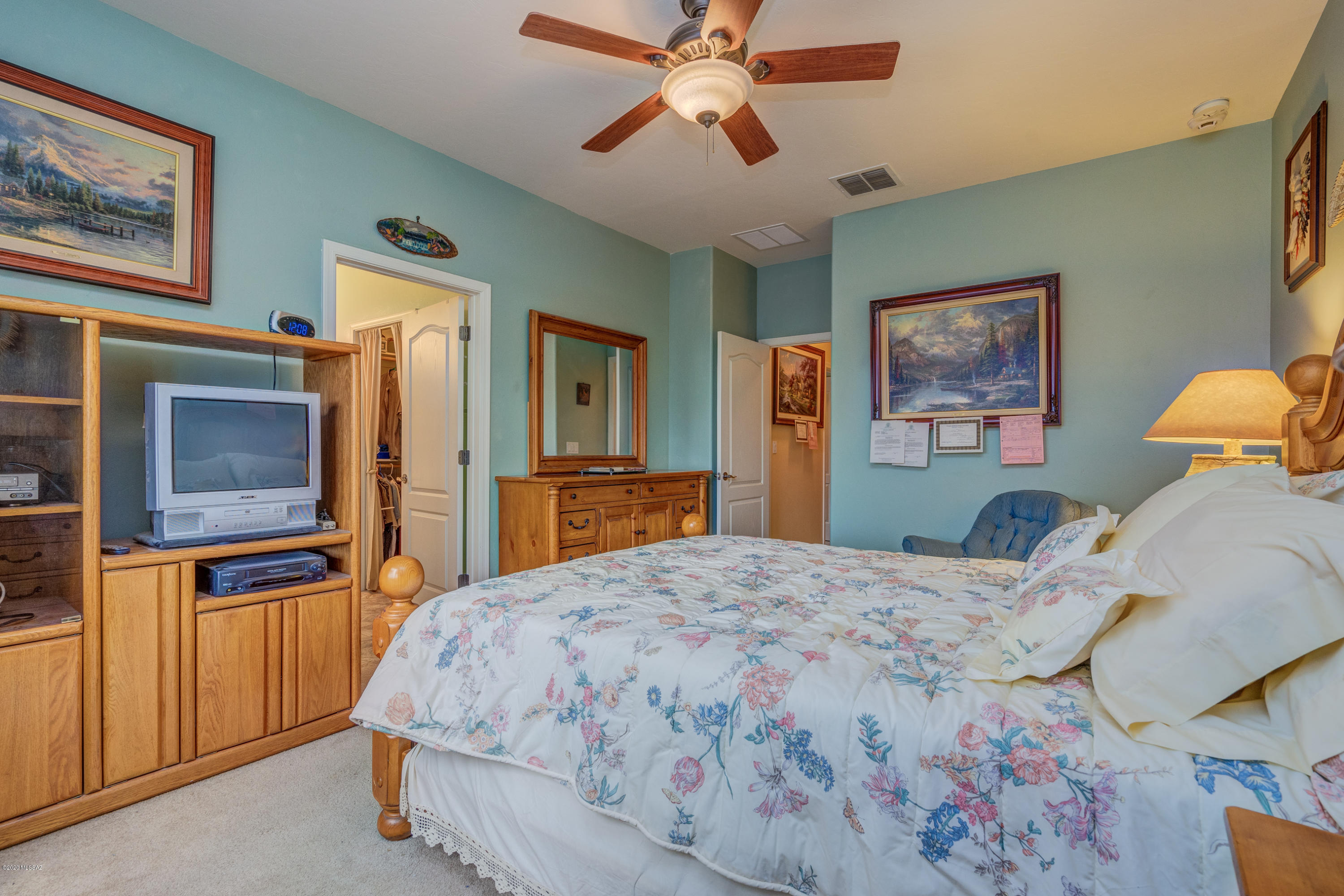 3640 East Northern Dancer Road Tucson, AZ 85739 - Photo 27 of 47 a bedroom with a bed and a flat screen tv