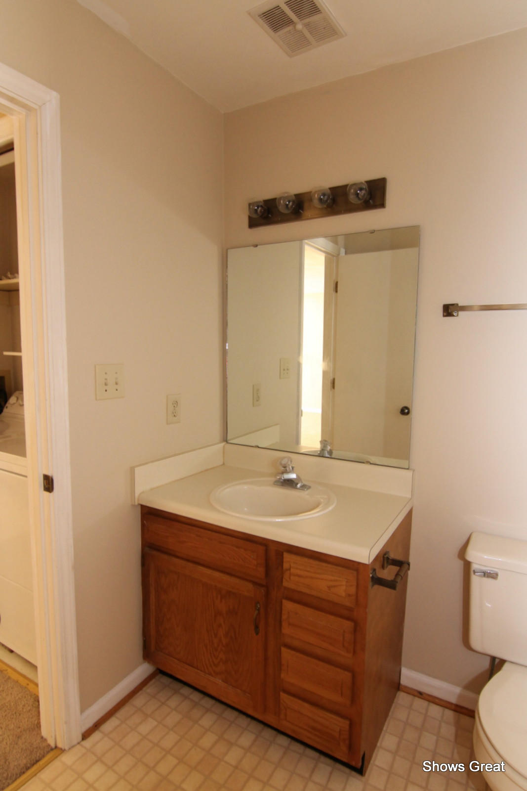 3267 Forest Ridge Road, Unit D Roanoke, VA 24018 - Photo 15 of 28 a bathroom with a granite countertop sink and a mirror