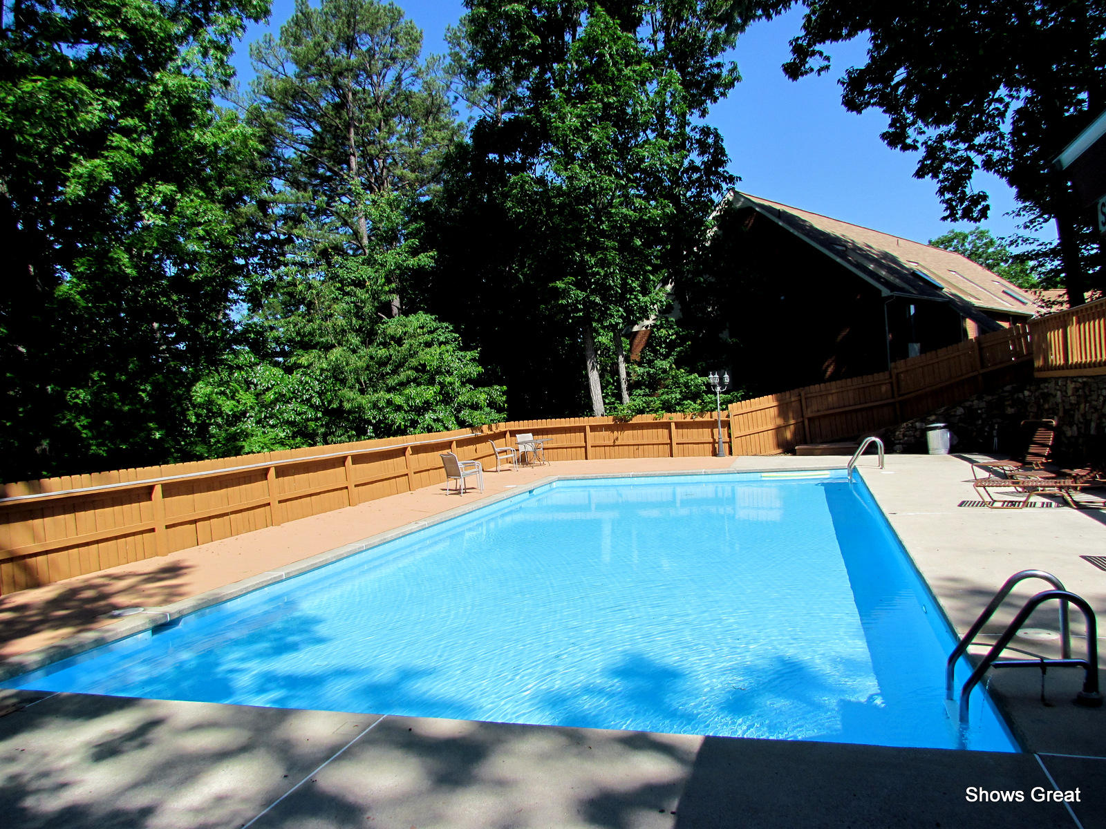3267 Forest Ridge Road, Unit D Roanoke, VA 24018 - Photo 27 of 28 a view of a swimming pool with a patio and yard