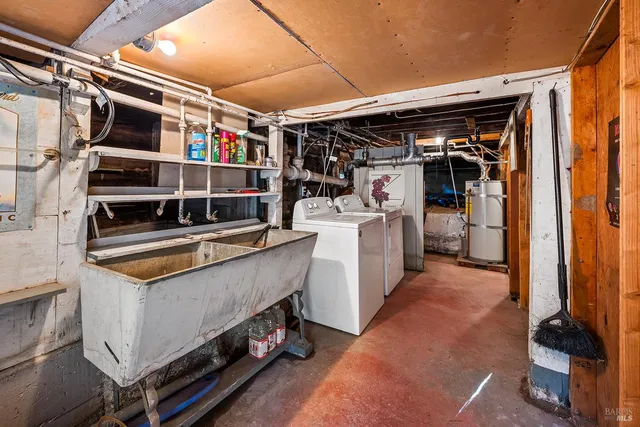 a storage room with washer and dryer