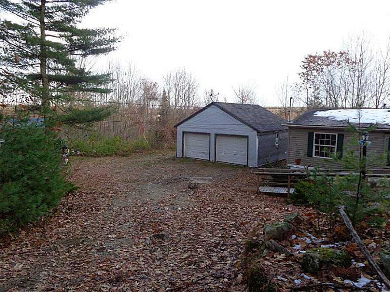 1171 North Pond Road Warren, ME 04864 - Photo 22 of 25 Garage. Driveway & garage