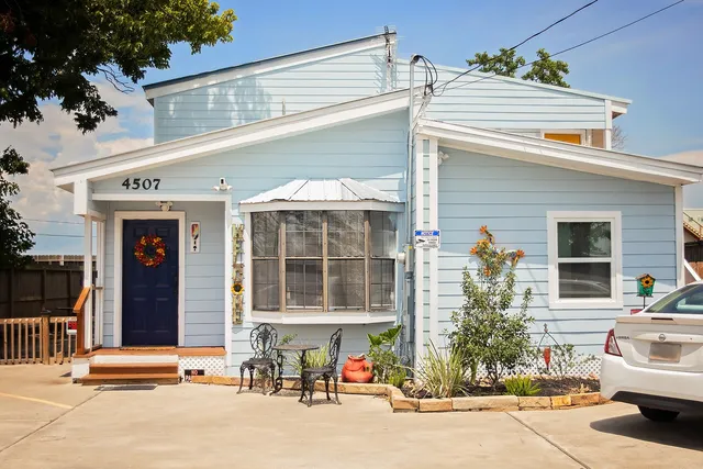 a front view of a house with a porch