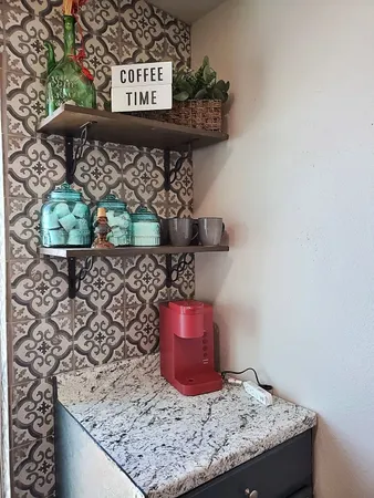 a bedroom with bed and window