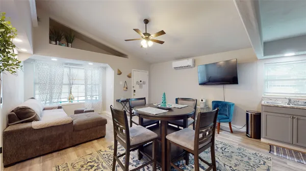 a view of a dining room with furniture