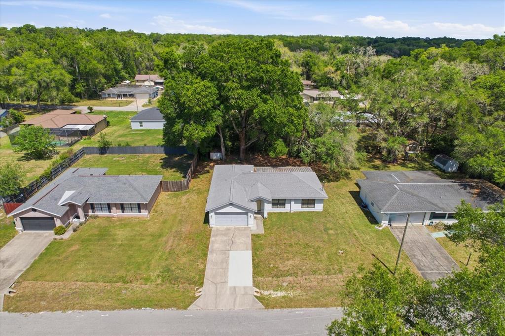 6355 East Rush Street Inverness, FL 34452 - Photo 25 of 27 an aerial view of a house with garden space and street view