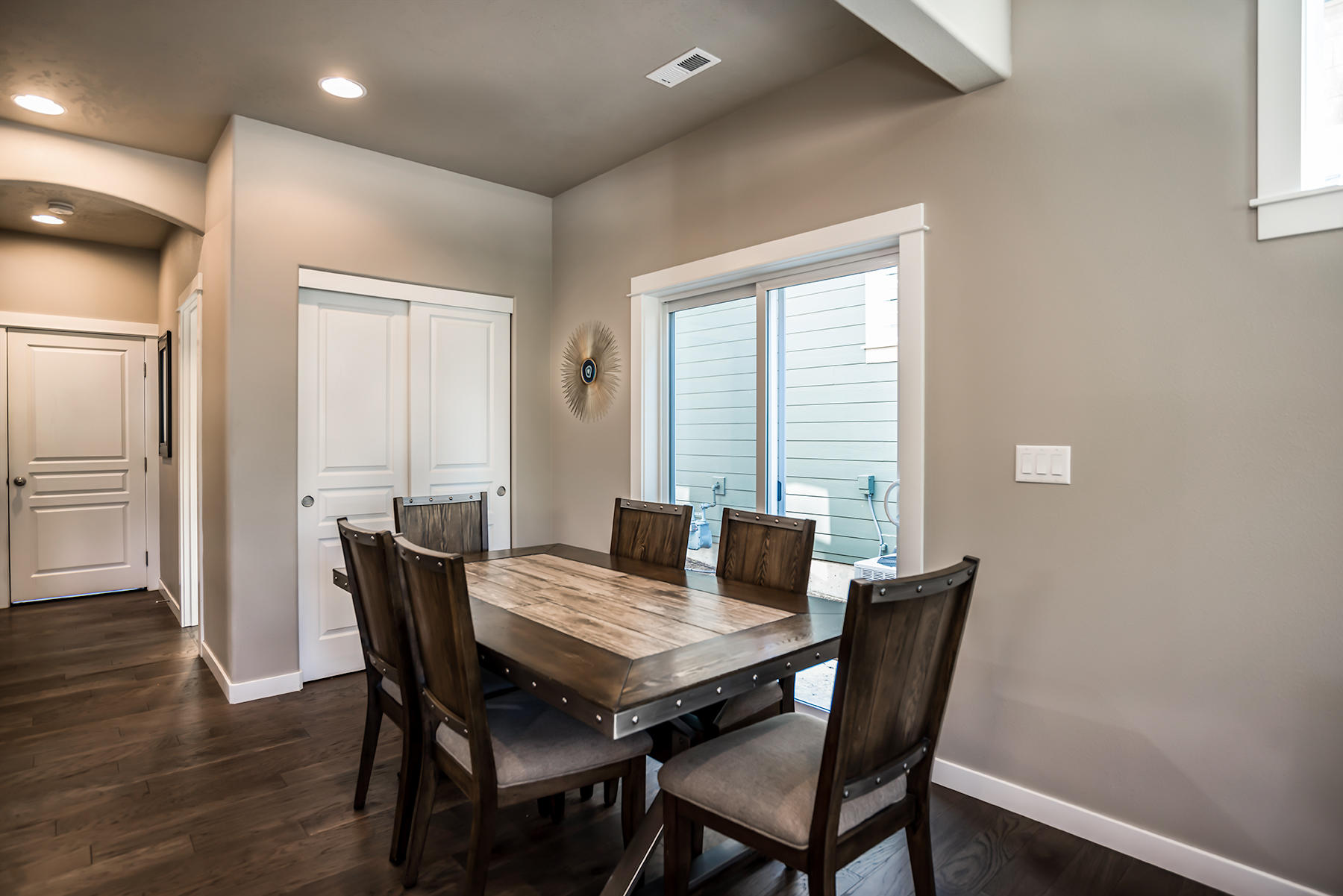 2546 Northwest Awbrey Road Bend, OR 97703 - Photo 10 of 22 a view of a dining room with furniture and wooden floor