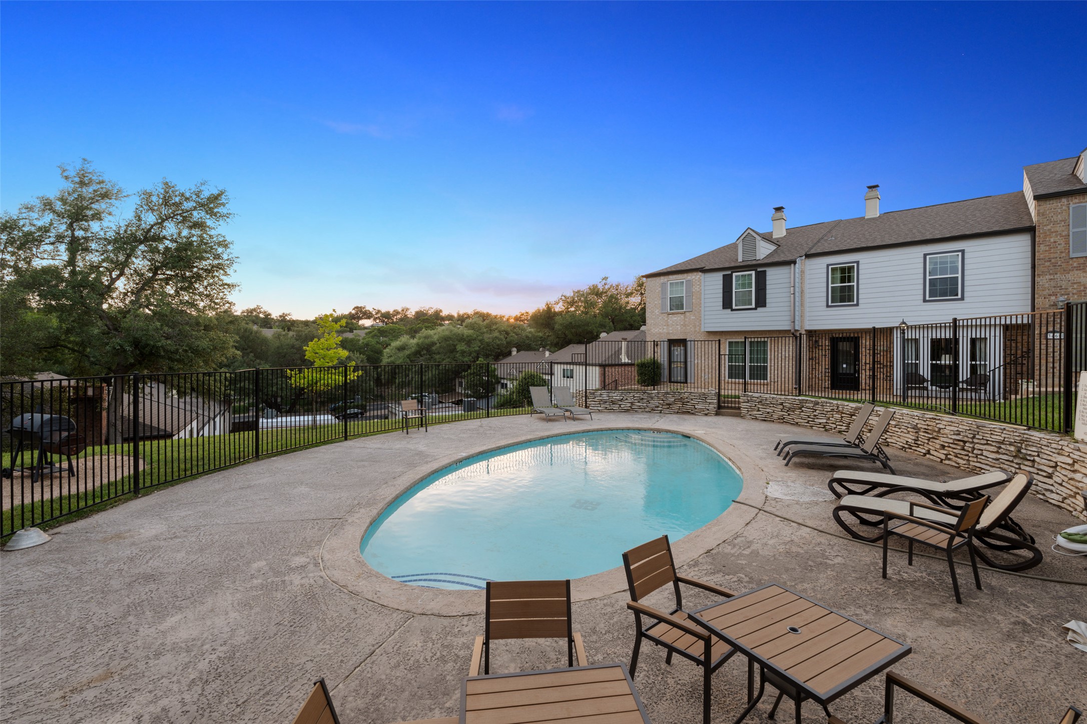 3467 North Hills Drive Austin, TX 78731 - Photo 39 of 40 a swimming pool with outdoor seating and yard