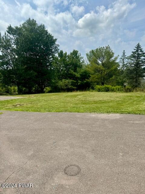 164 Tuthill Road Waymart, PA 18472 - Photo 33 of 33 a view of a field and a building in the background